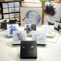 photo of art mounted on wood blocks