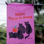 halloween garden flag with four black cats