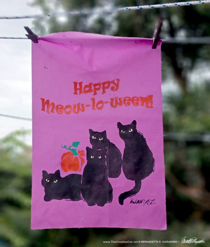 halloween garden flag with four black cats