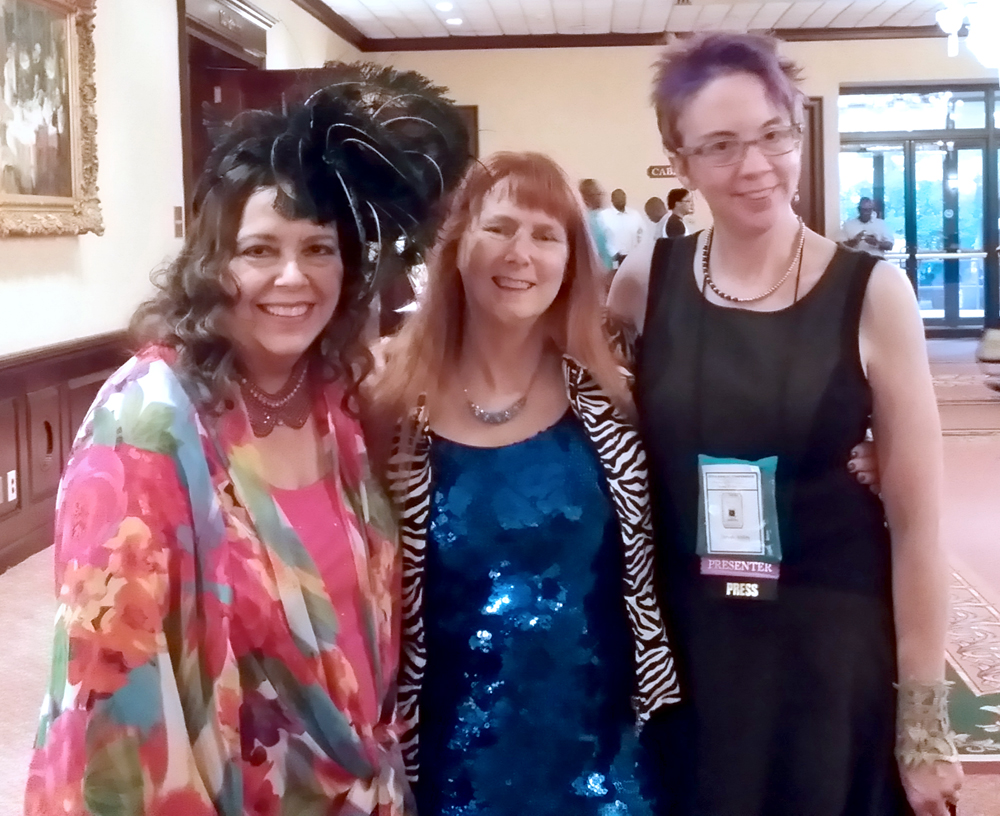Carole Nelson Douglas, Dusty RAinbolt and JaneA Kelly at the Cat Writers' Conference.