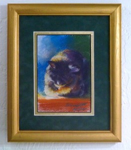 framed pastel sketch of cat