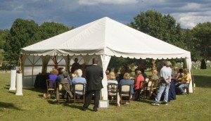 tent with people at pet memorial ceremony