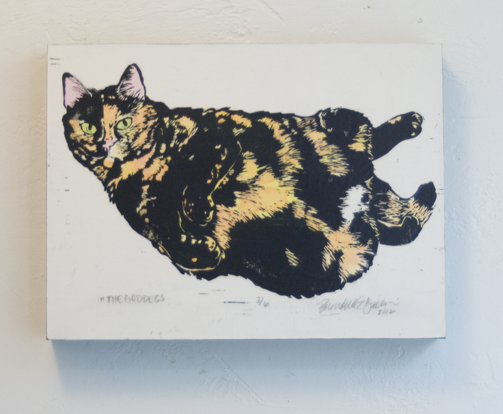 hand-colored linoleum block print of cat
