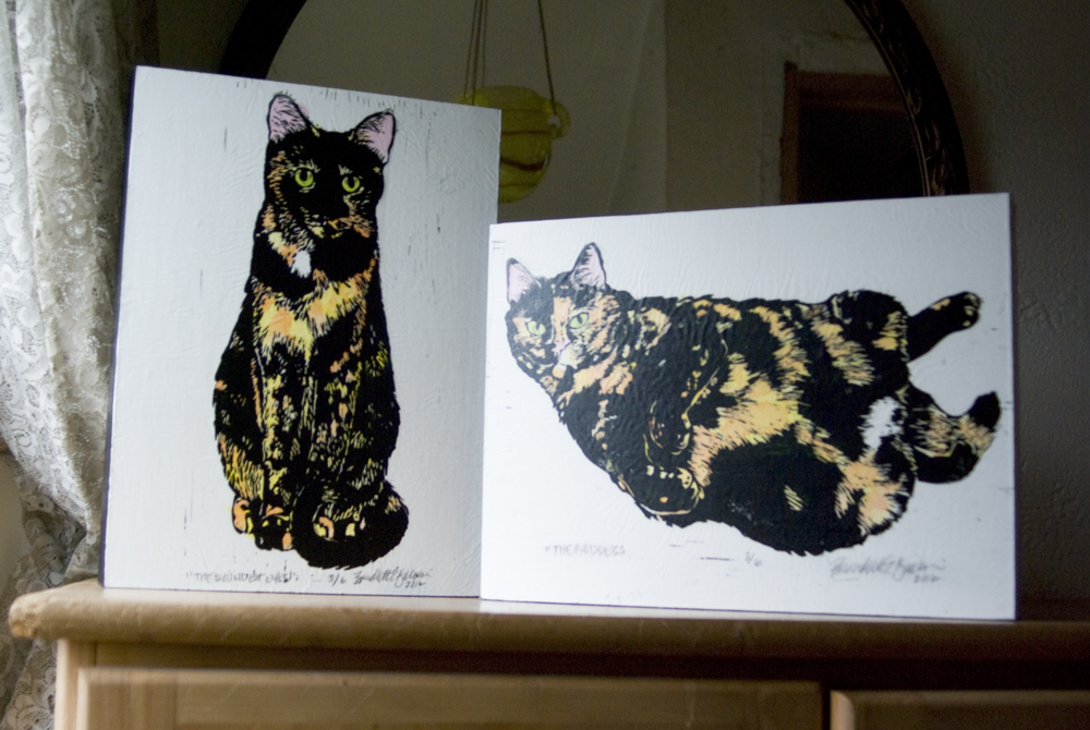 hand-colored linoleum block print of cat