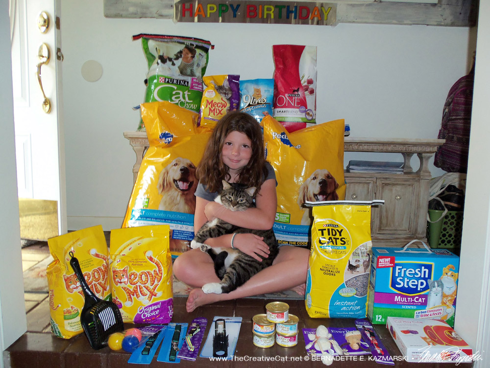 Cassidy with all the loot from her 10th birthday party.