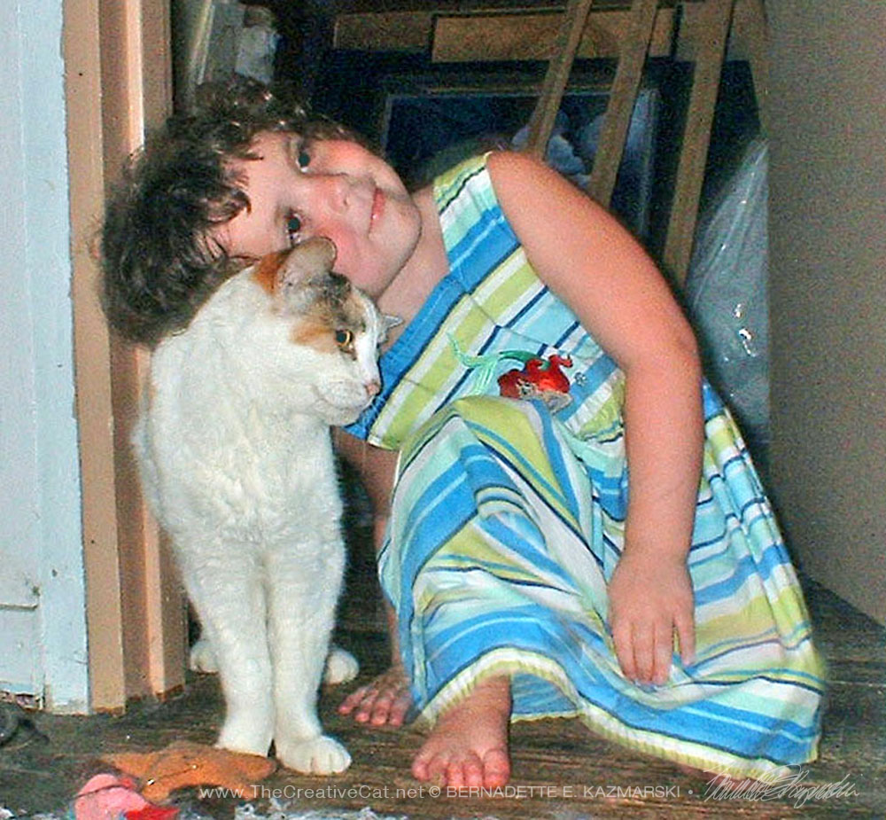 My great-niece Cassidy greets 15-year-old Cream.
