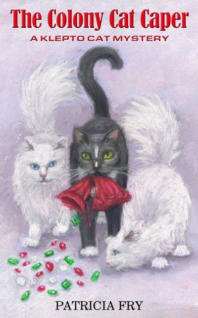 three cats with gems