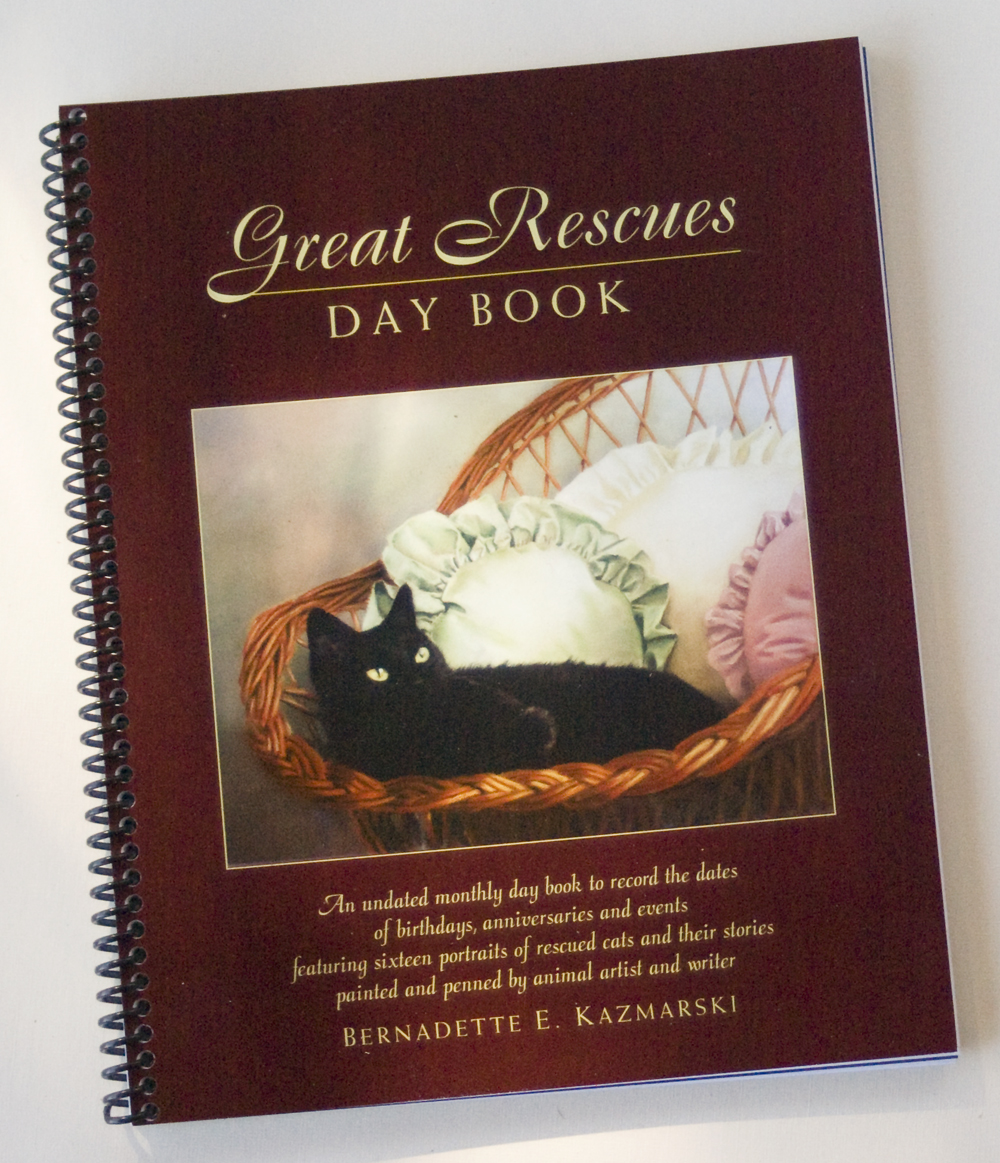 day book with cat portraits