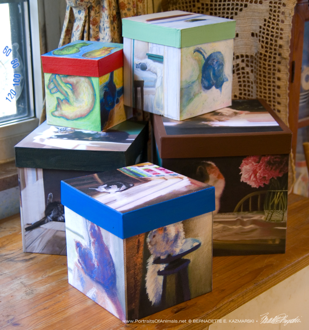 Cube-shaped keepsakes in various sizes feature five themed paintings.