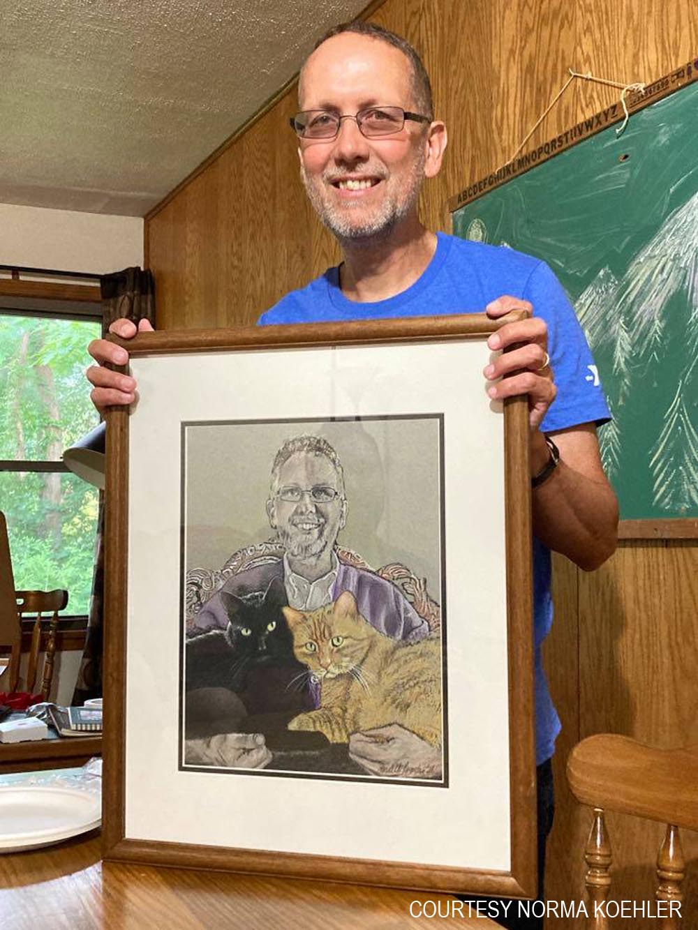 Keith with his portrait.