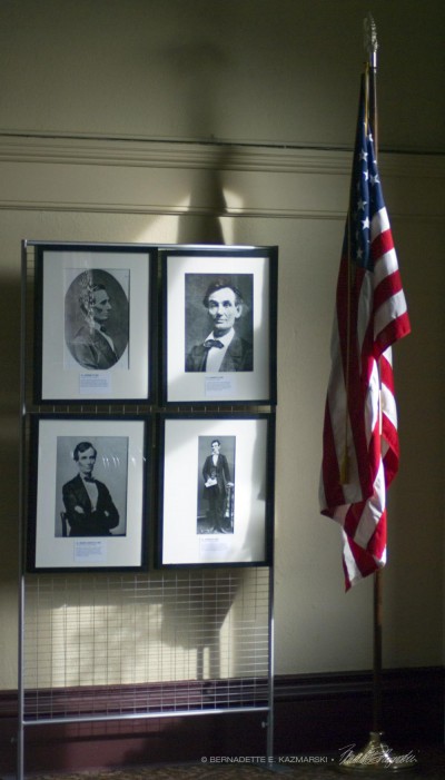 four photos of Lincoln with flag