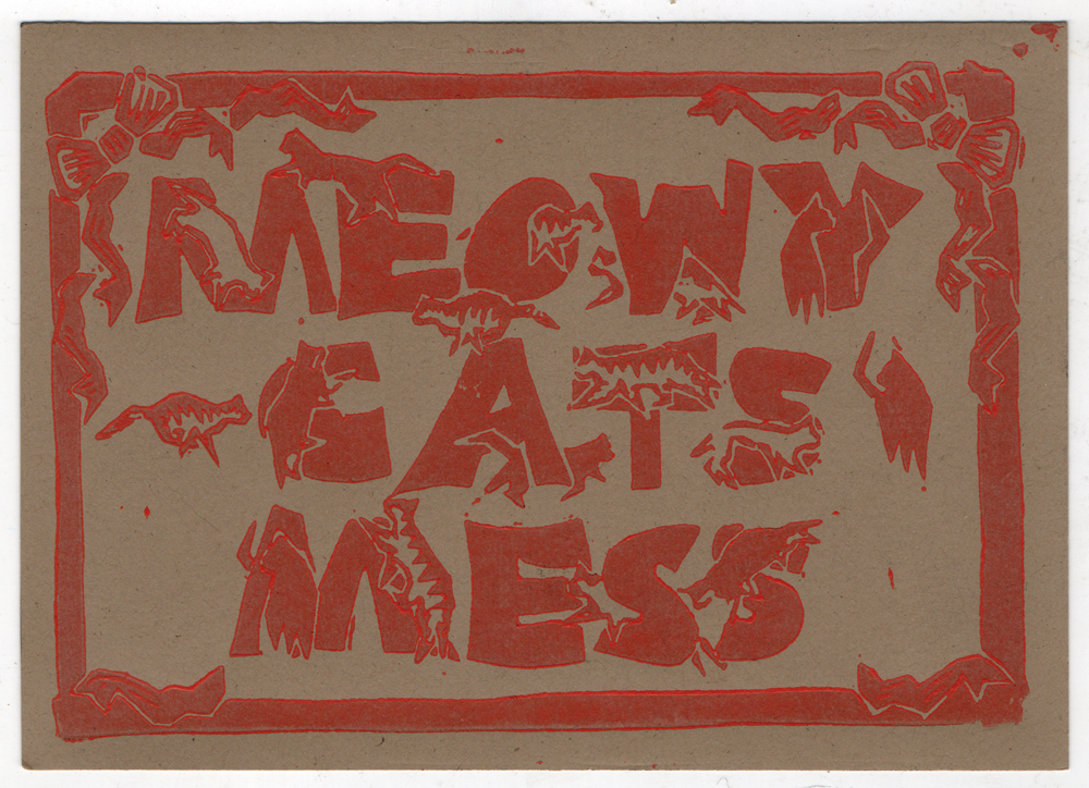 Meowy Cat's Mess in red on brown kraft.