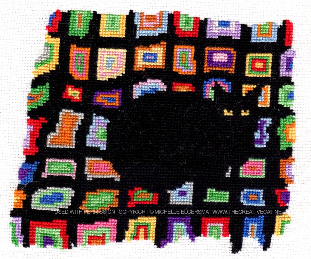 A cross-stitch made from my sketch "Mewsette on the Afghan", created by Dr. Michelle Elgersma.