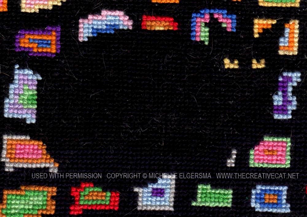 Detail of cross-stitch.