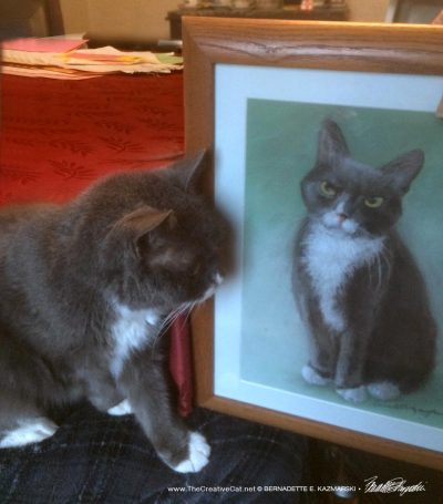 Oscar looks at his portrait.