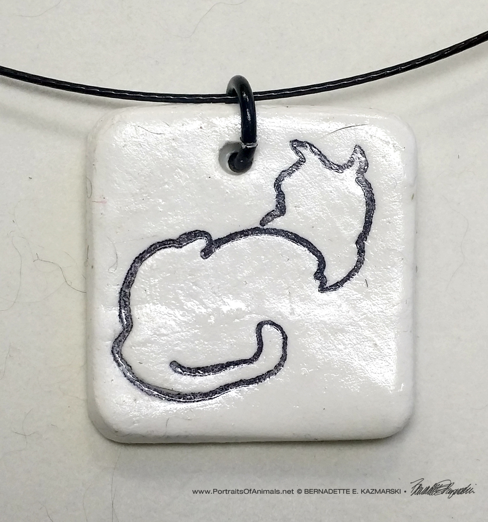"Back to Front" pendant, 1" x 1" square.