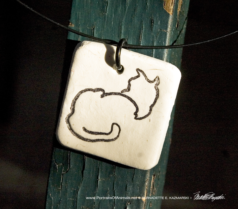"Back to Front" pendant, 1" x 1" square.