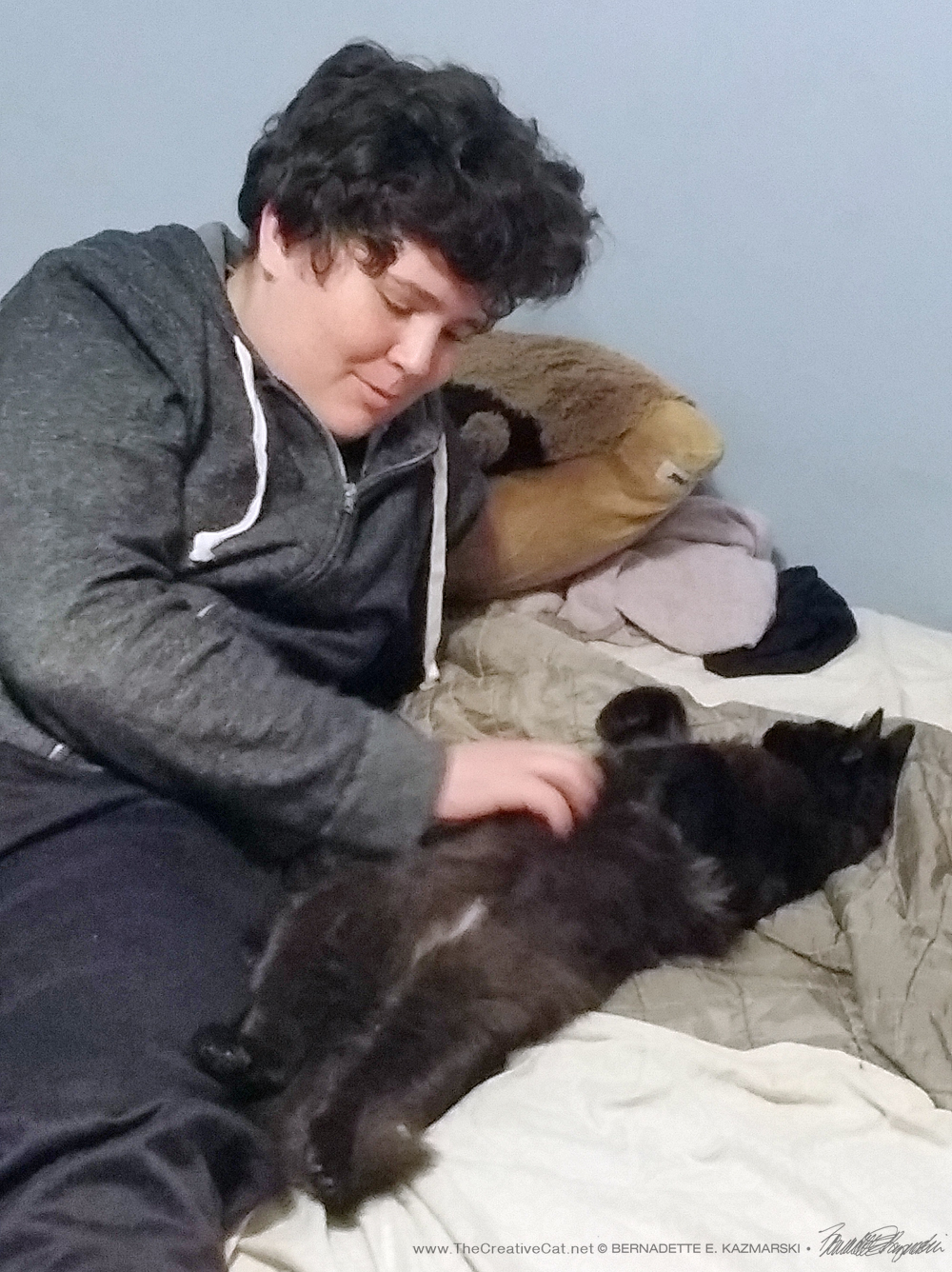 Kyler gives Simon a belly rub.