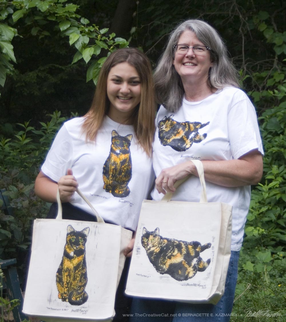 Jenna and her mom Mary Kay model the new tees and totes.