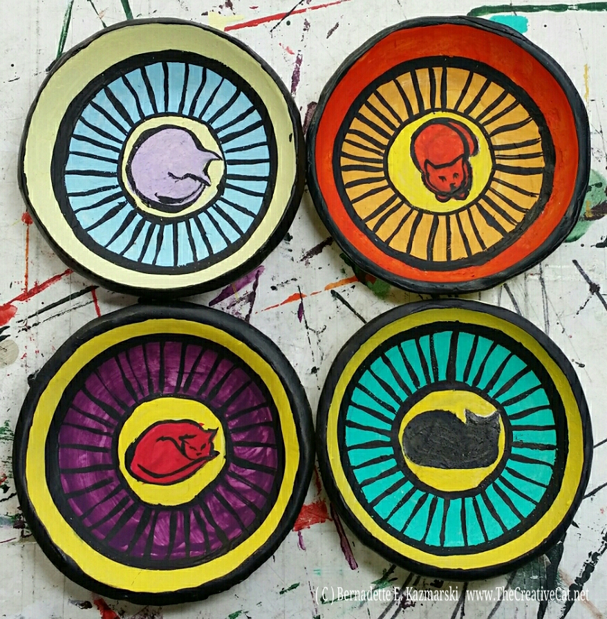 Handmade, hand-painted trinket dishes.