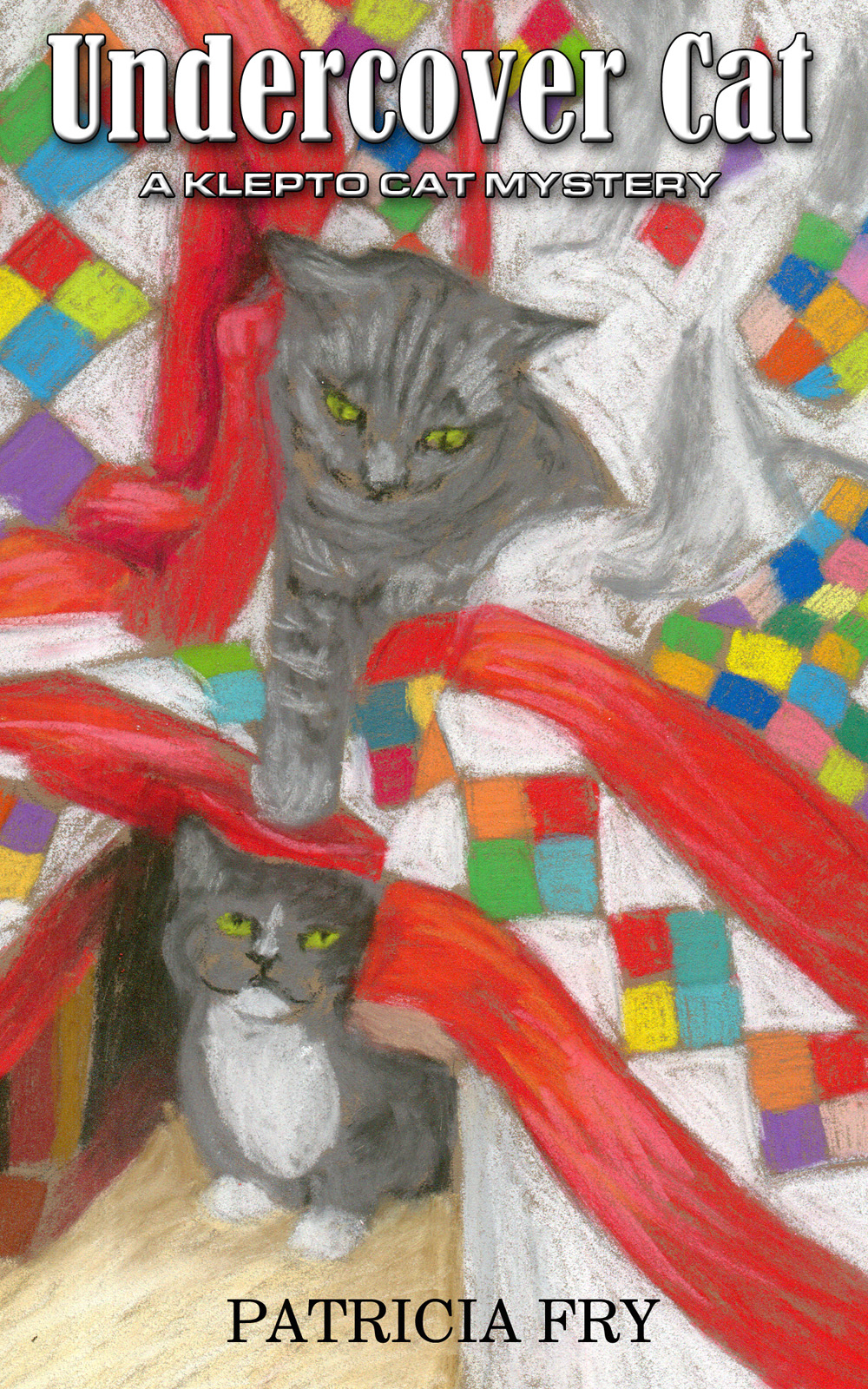 gray cats on colorful quit